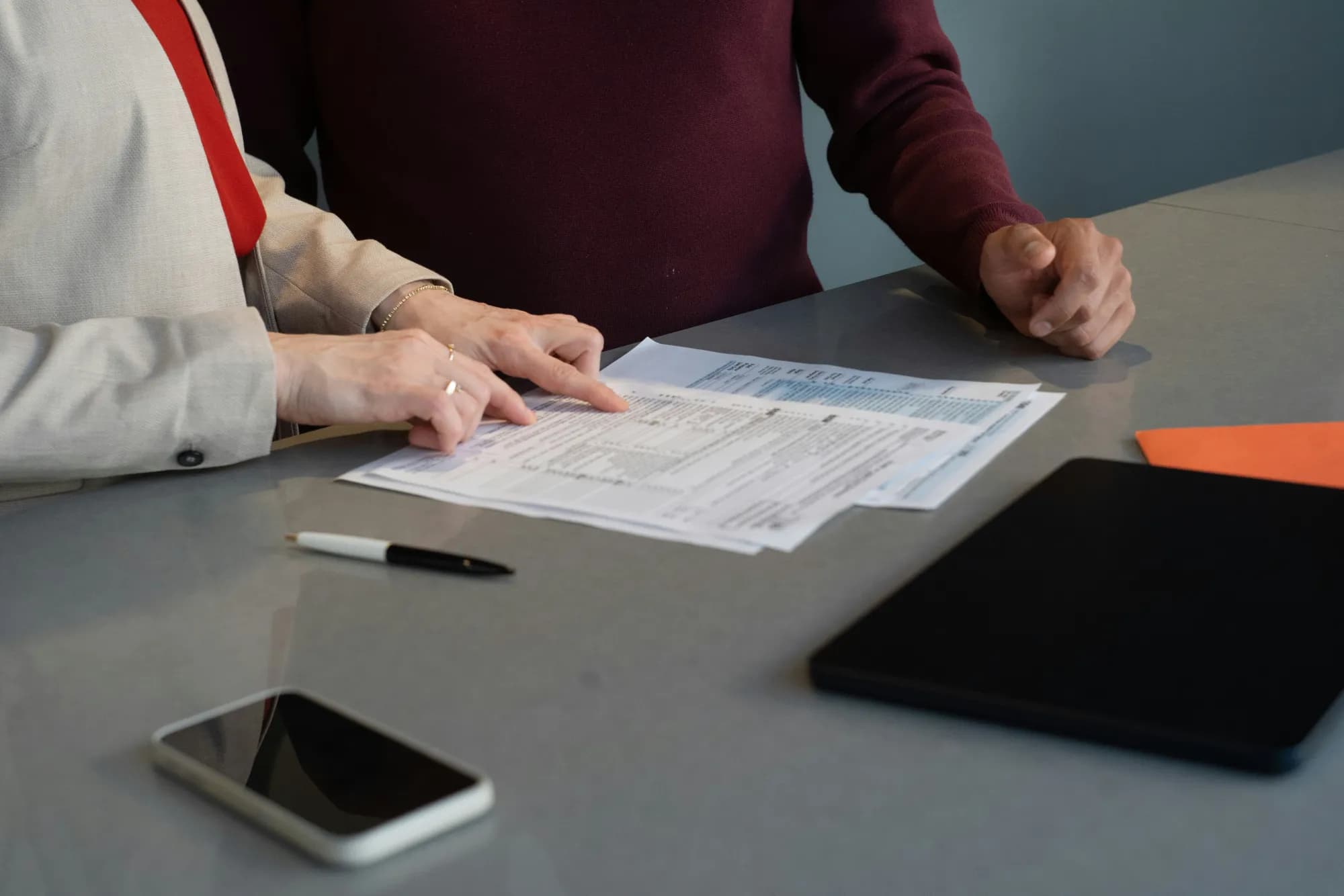 Lawyer reviewing a property purchase contract for a client buying real estate in Mallorca, Spain